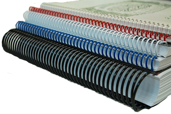 Assortment of coil-bound books